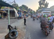 Pengaturan Arus Lalu Lintas di U-Turn Sandratek Oleh Personil Polsek CipTim