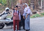 Kapolsek Legok berikan waktu kepada anggota untuk mengantarkan anak ke sekolah pada hari pertama masuk sekolah